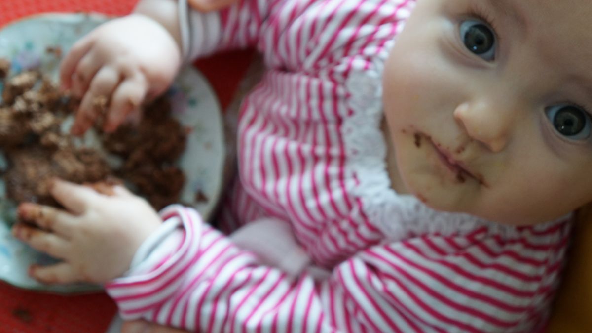 First contact with chocolate cake.